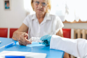 Senior woman during a medical exam with practitioner