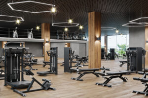 Modern gym interior with sport and fitness equipment, fitness ce